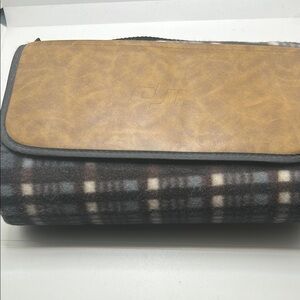 DJI Tan and gray throw blanket